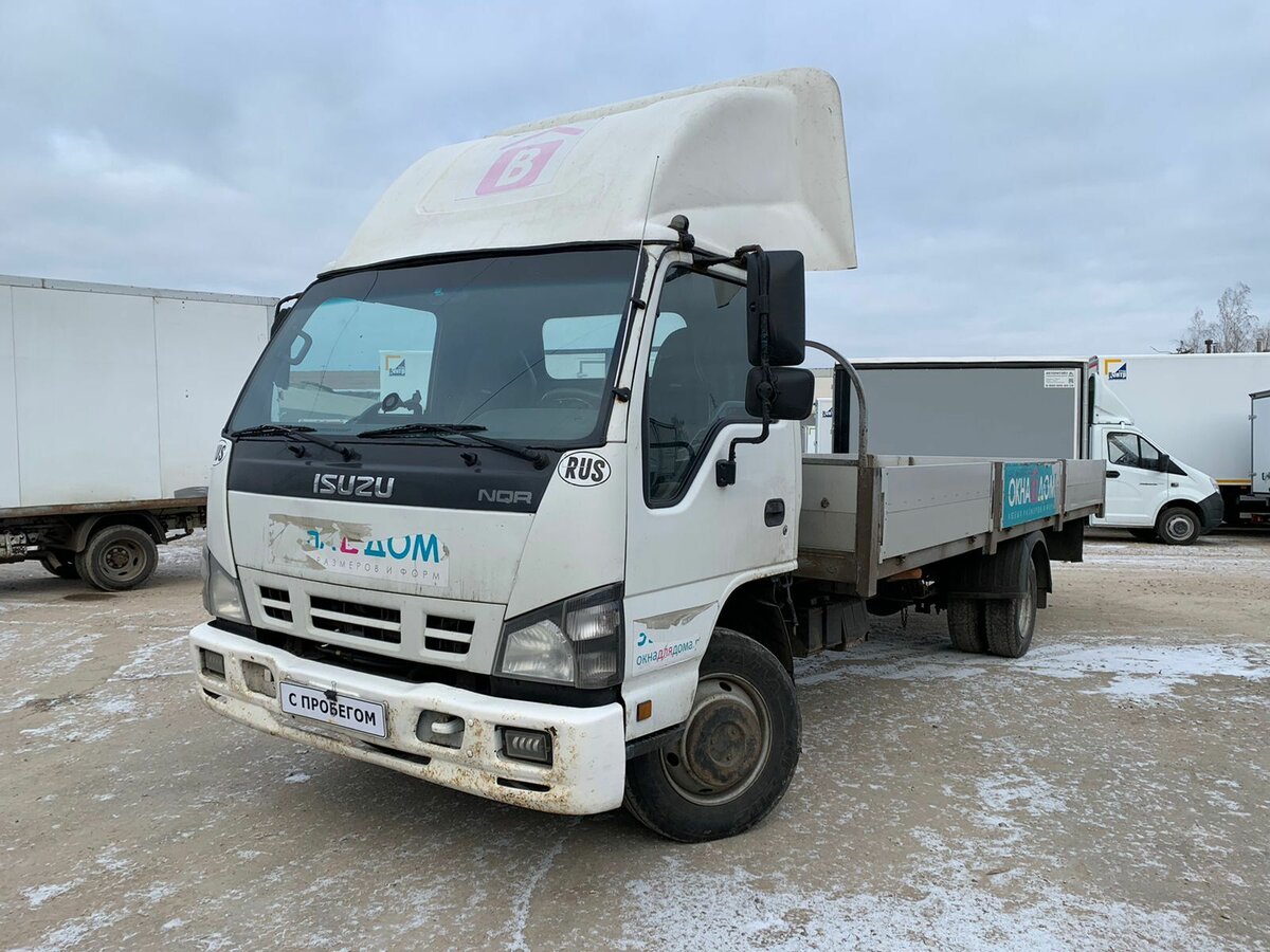 Isuzu elf n. Isuzu Elf (n-Series). Исудзу Грузовики 2010 года. Дром ру Грузовики.